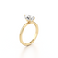 Pear-cut Engagement Ring with a Plain Gold Band