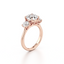 Round-cut Three Stone Engagement Ring with Round Side Stones in Gold