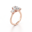 Oval-cut Three Stone Engagement Ring with Round Side Stones in Gold