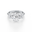 Oval-cut Three Stone Engagement Ring with Round Side Stones in Gold