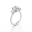 Oval-cut Three Stone Engagement Ring with Round Side Stones in Gold