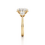 Oval-cut Three Stone Engagement Ring with Round Side Stones in Gold