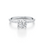 Round-cut Secret Halo Engagement Ring with a Pavé Diamond Band