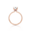Oval-cut Secret Halo Engagement Ring with a Pavé Diamond Band