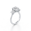 Round-cut Three Stone Engagement Ring with Round Side Stones in Gold