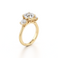 Round-cut Three Stone Engagement Ring with Round Side Stones in Gold