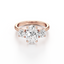 Oval-cut Three Stone Engagement Ring with Round Side Stones in Gold