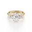 Oval-cut Three Stone Engagement Ring with Round Side Stones in Gold