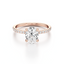 Oval-cut Secret Halo Engagement Ring with a Pavé Diamond Band