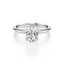 Oval-cut Engagement Ring with a Knife Edge Gold Band